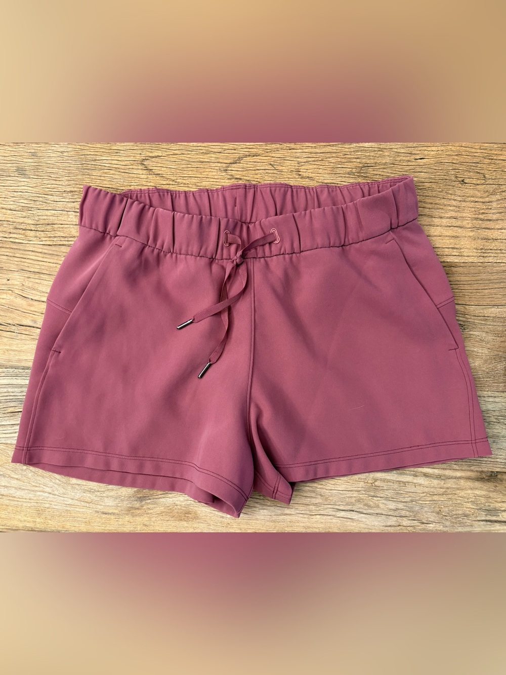 EUC Lululemon On The Fly shorts, mauve/pink color, size 10